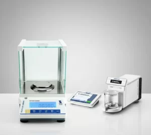 Stuccler analytical balance (left) and Mettler Toledo ultra-microbalance (right) for lab weighing.