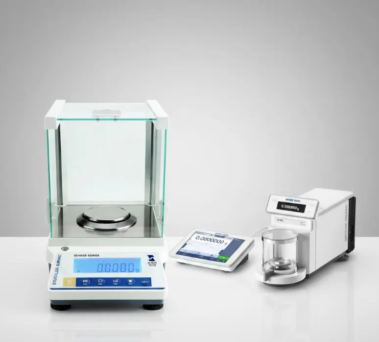 Stuccler analytical balance (left) and Mettler Toledo ultra-microbalance (right) for lab weighing.