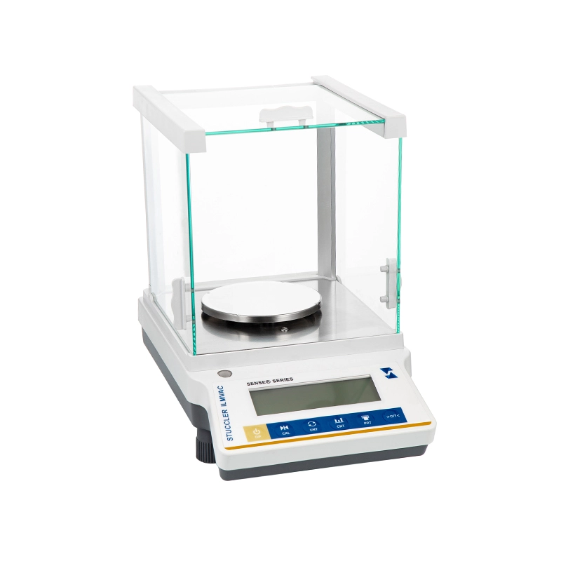 Stuccler SENSE series jewelry balance with draft shield, ideal for high-precision weighing of gems and metals.