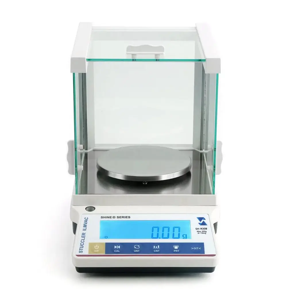 SHINE digital weighing balance with a modern design and a stainless steel weighing platform.