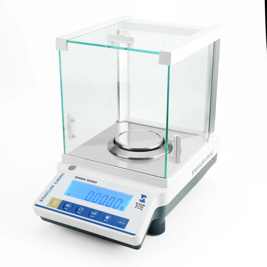 Stuccler SE-R22W analytical laboratory balance with 0.1mg precision and draft shield for highly accurate weighing.