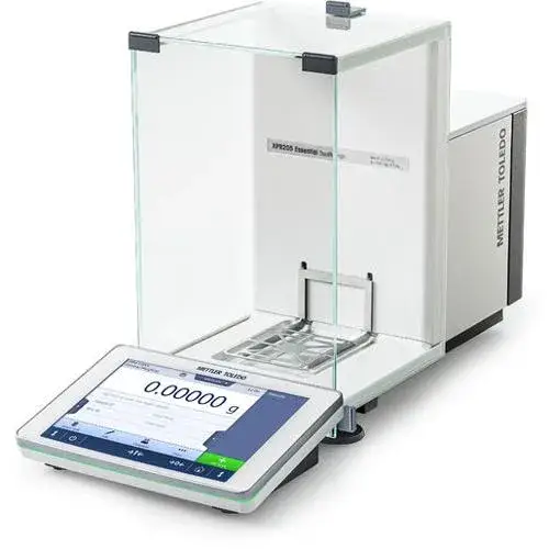 Mettler Toledo premium analytical balance with a glass draft shield and digital touchscreen interface.